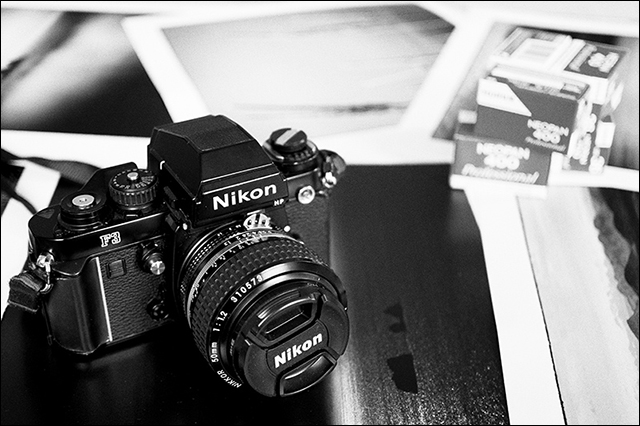 Nikon F3HP with printouts and film
